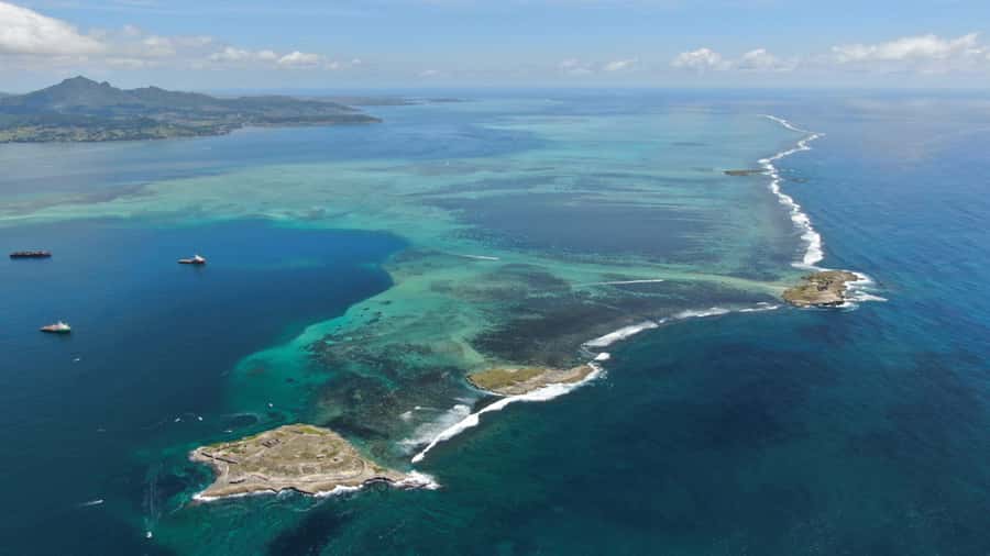 5 Islands All-Inclusive Speedboat w/Snorkeling Sea Turtle - Ile aux Cerfs beach time: BBQ lunch, open bar energy, and local entertainment