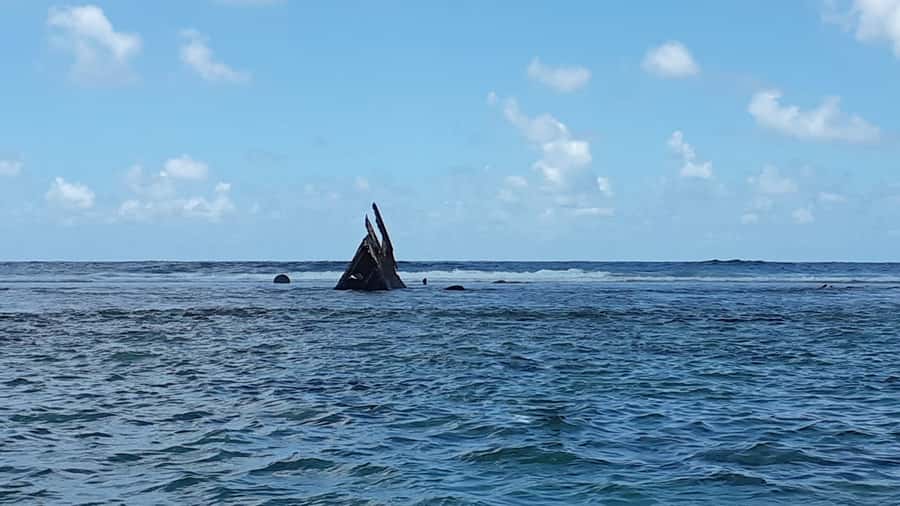 Blue Bay: Half-Day Snorkeling Trip with Creole Picnic Lunch - Sliding along the coast toward the first lagoon snorkeling spot