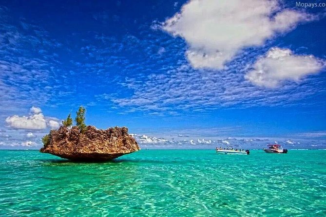 Catamaran Cruise to Ile Aux Bénitiers: Dolphin watch, Crystal Rock & Transfer - Crystal Rock and the La Preneuse Area: Views Plus Swim Breaks