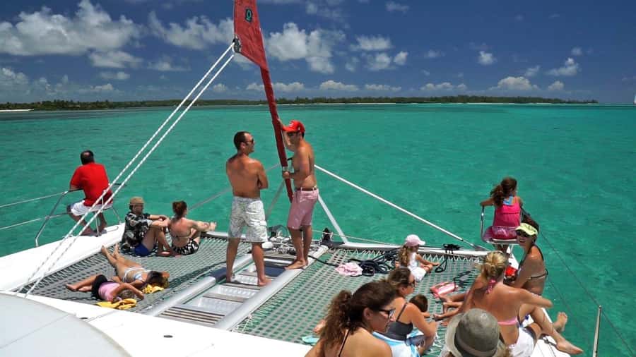 Catamaran Trip to Ile au Cerfs with Lunch and GRSE waterfall - Entering The Day: The catamaran vibe near Trou D’Eau Douce
