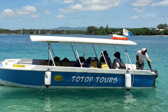 Discover the East of Mauritius: Full-day All-inclusive tour (Visit to 3 parks) - Mahebourg waterfront and market: Bataille de la Passe to everyday snacks