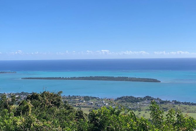 Dolphin Experience in Open Sea and South West Tour of Mauritius including Lunch - Grand Bassin Sacred Lake and Trou aux Cerf crater: two cultural angles in one sweep