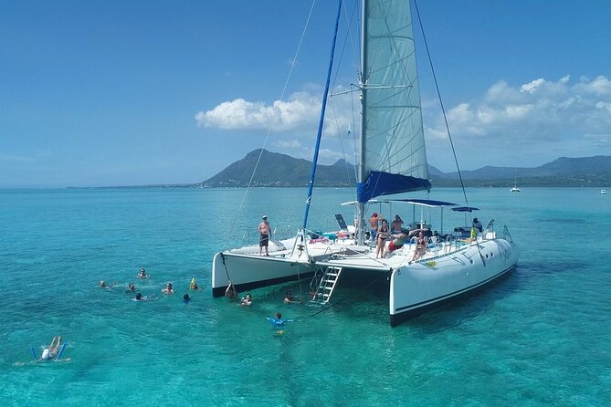 Full Day Catamaran Cruise on shared basis to Bénitiers Island - Setting sail from Le Morne Anglers Club
