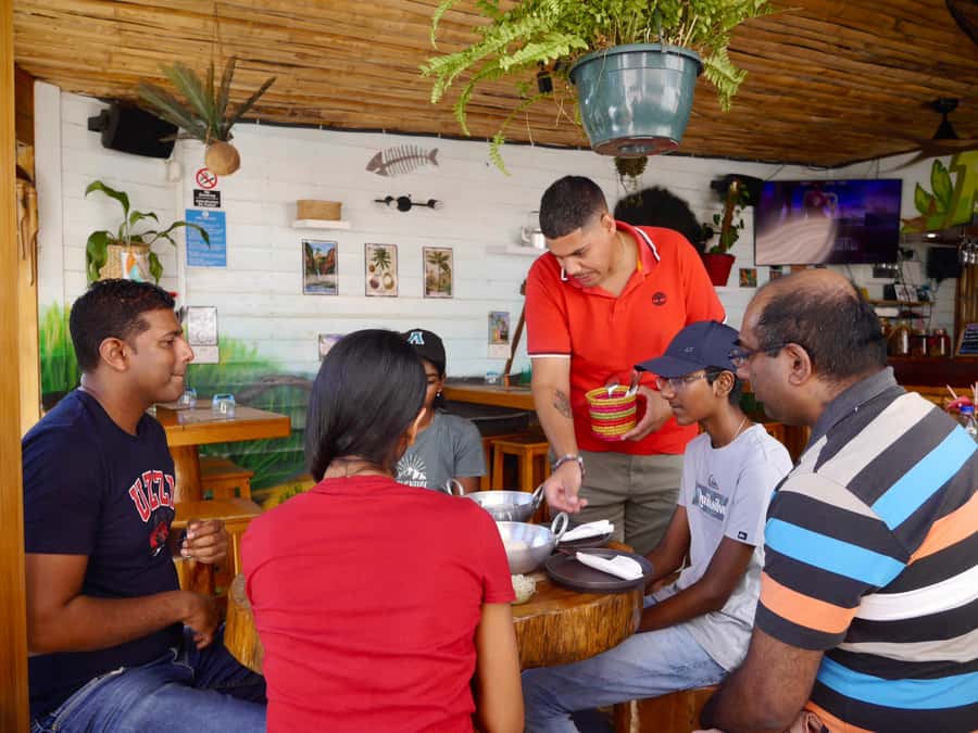 Grand Baie: Coastal Cuisine & Culture Walking Tour - Stop 1: Local café street food for quick local flavor