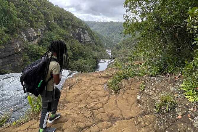 Guided Hiking The 7 WATERFALLS with relaxing car tour in the end - Lunch, Water, and the Food Reality on a Wet Trail