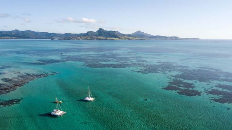 Ile Aux Cerfs Catamaran Trip w/ Lunch, Drinks & Transfer - Cruising the lagoon to your snorkeling and swim break