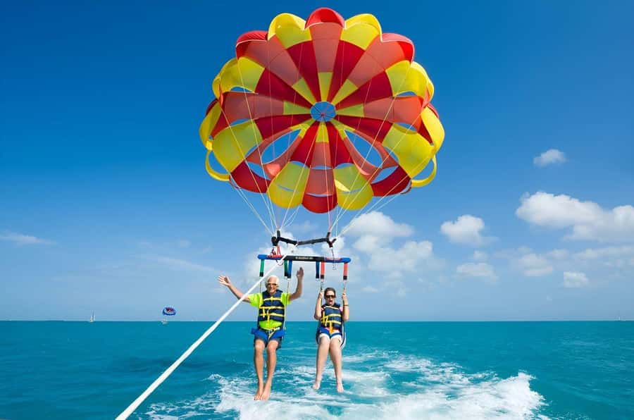 Mauritius: 3 Activities + Ile aux Cerfs Boat tour w/ BBQ - Belle Mare: where the adrenaline starts (parasailing, underseawalk, tube ride)