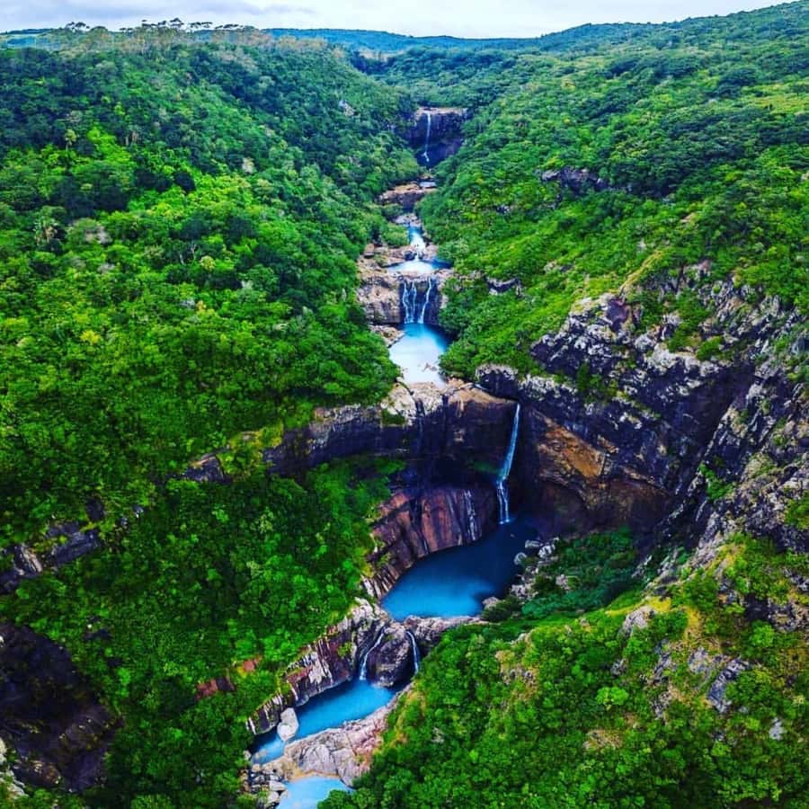 Mauritius: 7 Waterfalls Hike with Lunch and Hotel Transfers - From Hotel Pickup to Henrietta: How Your Morning Sets Up