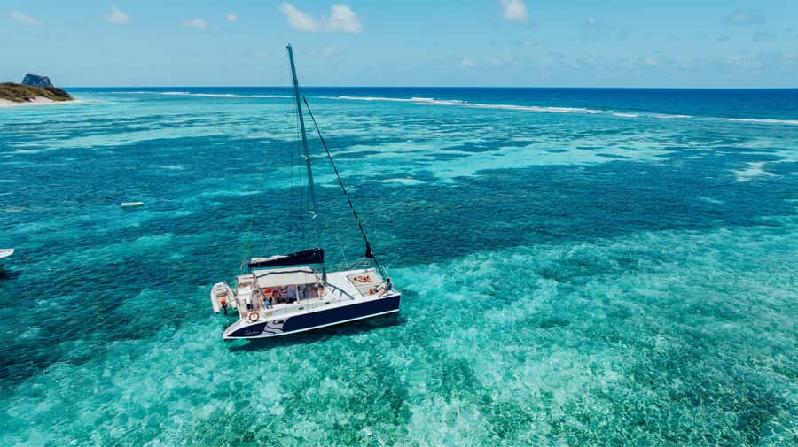 North of Mauritius: Catamaran Cruise w/ BBQ Lunch - Gabriel Island time: swim, snorkel, and walk the beaches