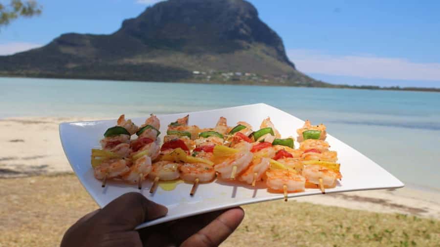 Private Île aux Bénitiers Boat: Dolphin Snorkeling & Lobster - Crystal Rock snorkeling near Le Morne Mountain: clear water, easy access, great photos