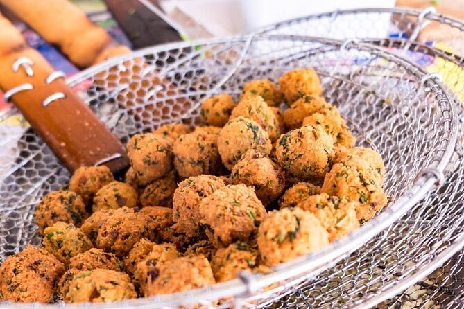 Street Food Private Tour in Port Louis - Le Caudan Waterfront: using the waterfront as an orientation reset